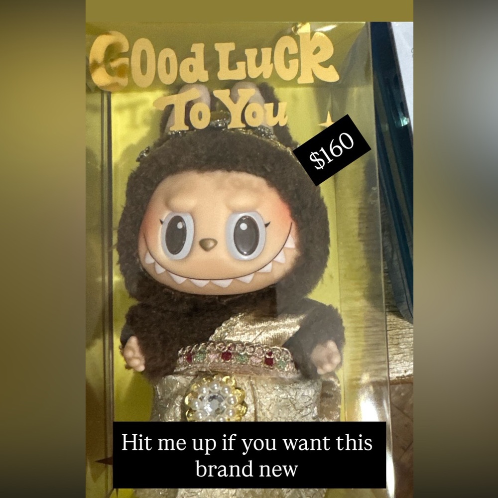 Adorable Figurine with Brown and Gold Outfit